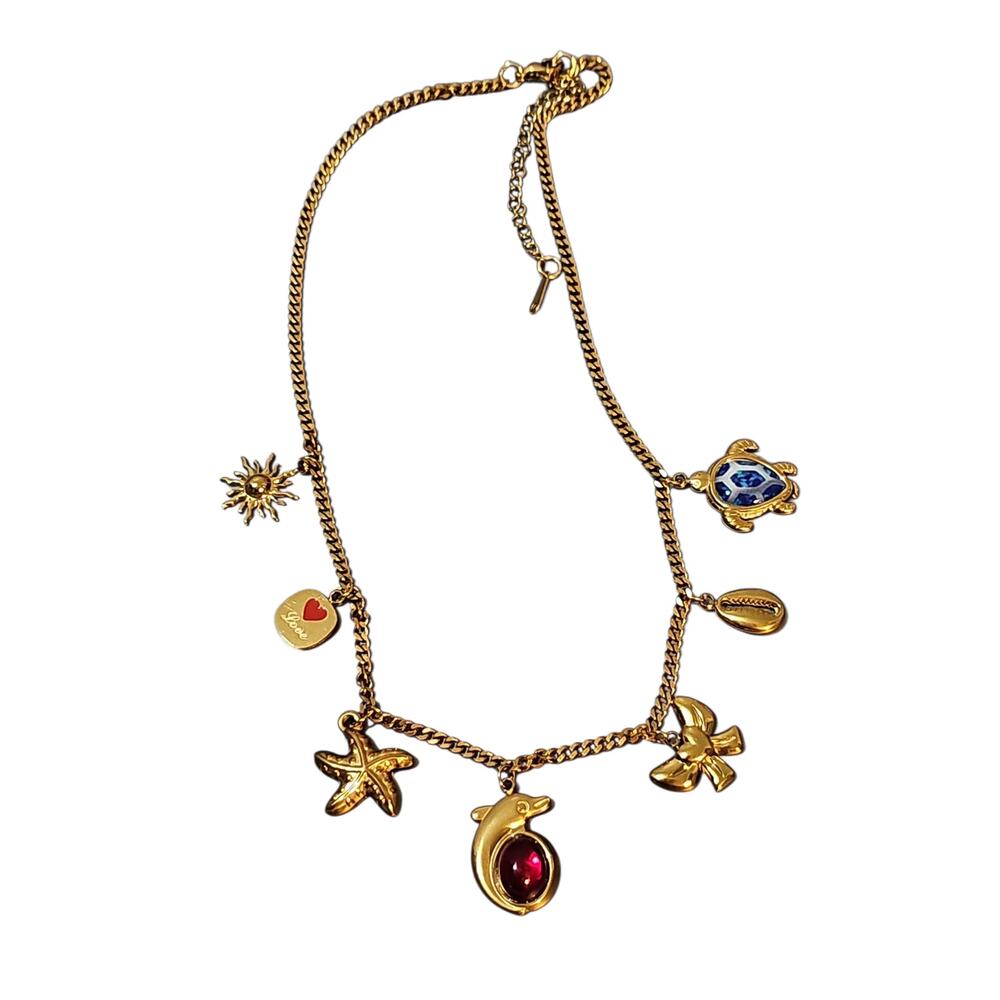 NEW Gold Tone Multi Charm Necklace Dolphin turtle Bow Star Seashell Coastal